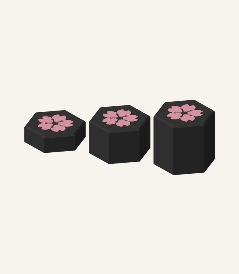 Render of three hexagonal pedestals of different heights with pink blossom inlays